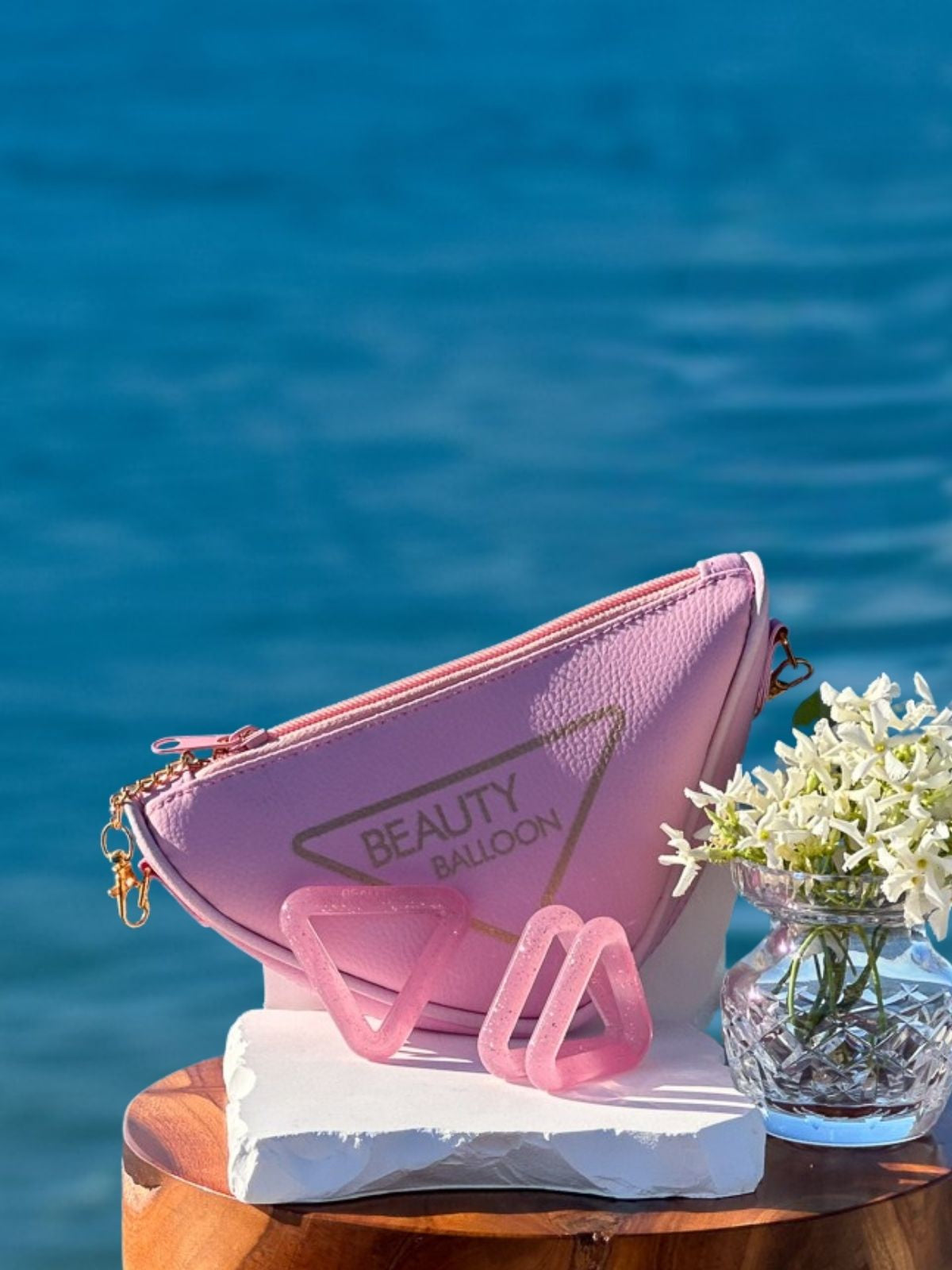 Doctor-designed Neck-Up Strength System on water background — natural face and neck strengthening for lift, jaw relief, better breathing, and sleep support.